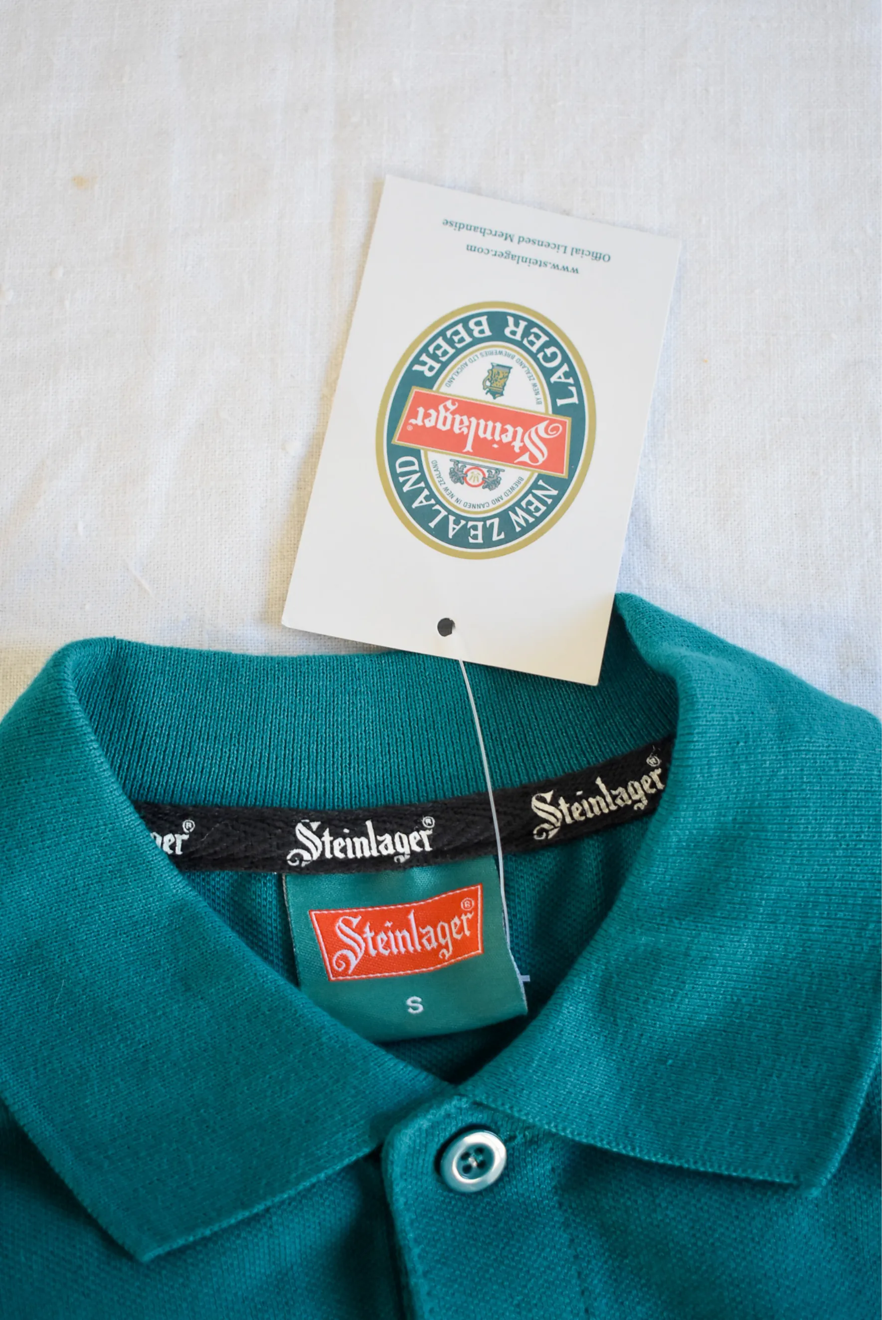 Vintage Steinlager polo, S NWT